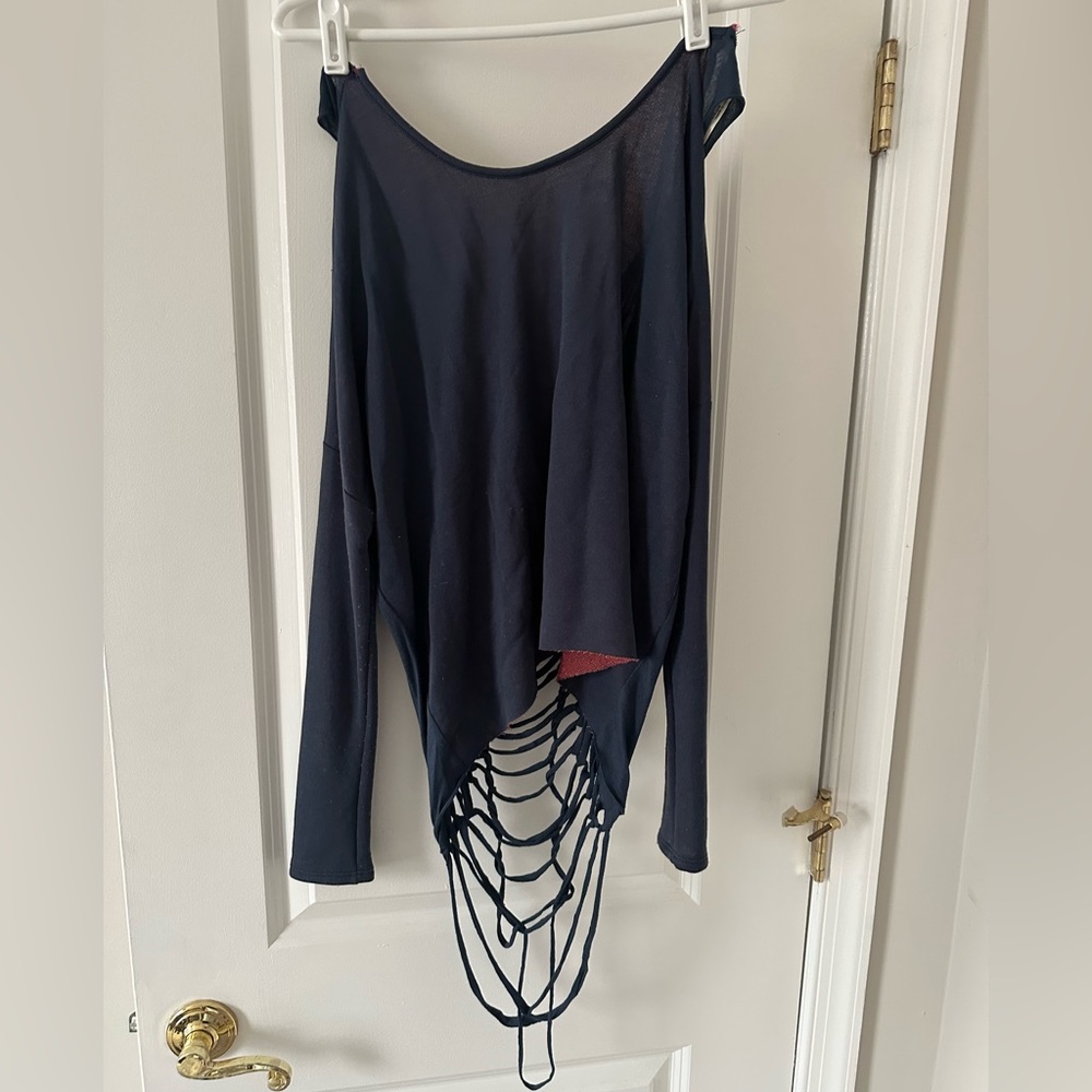 Unique off the shoulder sweater with open back detail